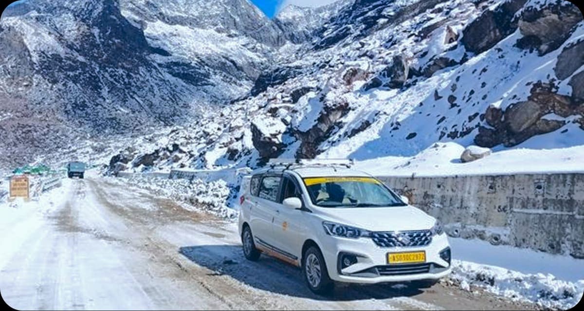 Explore Roots cab on a snow-covered mountain road